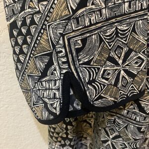 Catherines Tunic Blouse with Geometric Print & Cut Out Accent Around Neck 14/16W